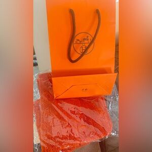 . HERMES ORANGE CARRE STAIRS HAND TOWEL NWT